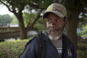 Waco, a man experiencing homelessness, who was standing near Riverside Dr. says he has been hit by two cars in Austin. CREDIT MIGUEL GUTIERREZ JR./ KUT NEWS