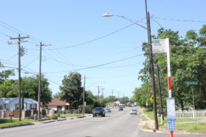 Ponziano catches the 350 bus on Montopolis Dr. It's the area with the highest percentage of poverty in Austin. She says it's difficult to cross the road safely. CREDIT KATE MCGEE/KUT NEWS