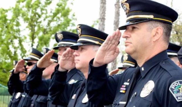 police officers saluting